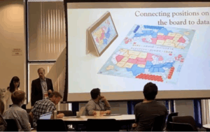 Screenshot 2025-10-17 at 114400 AM - Indelible Learning - Indelible Learning Dr. Jasminka Criley and Stuart Criley presenting Election Lab to classroom attendees.